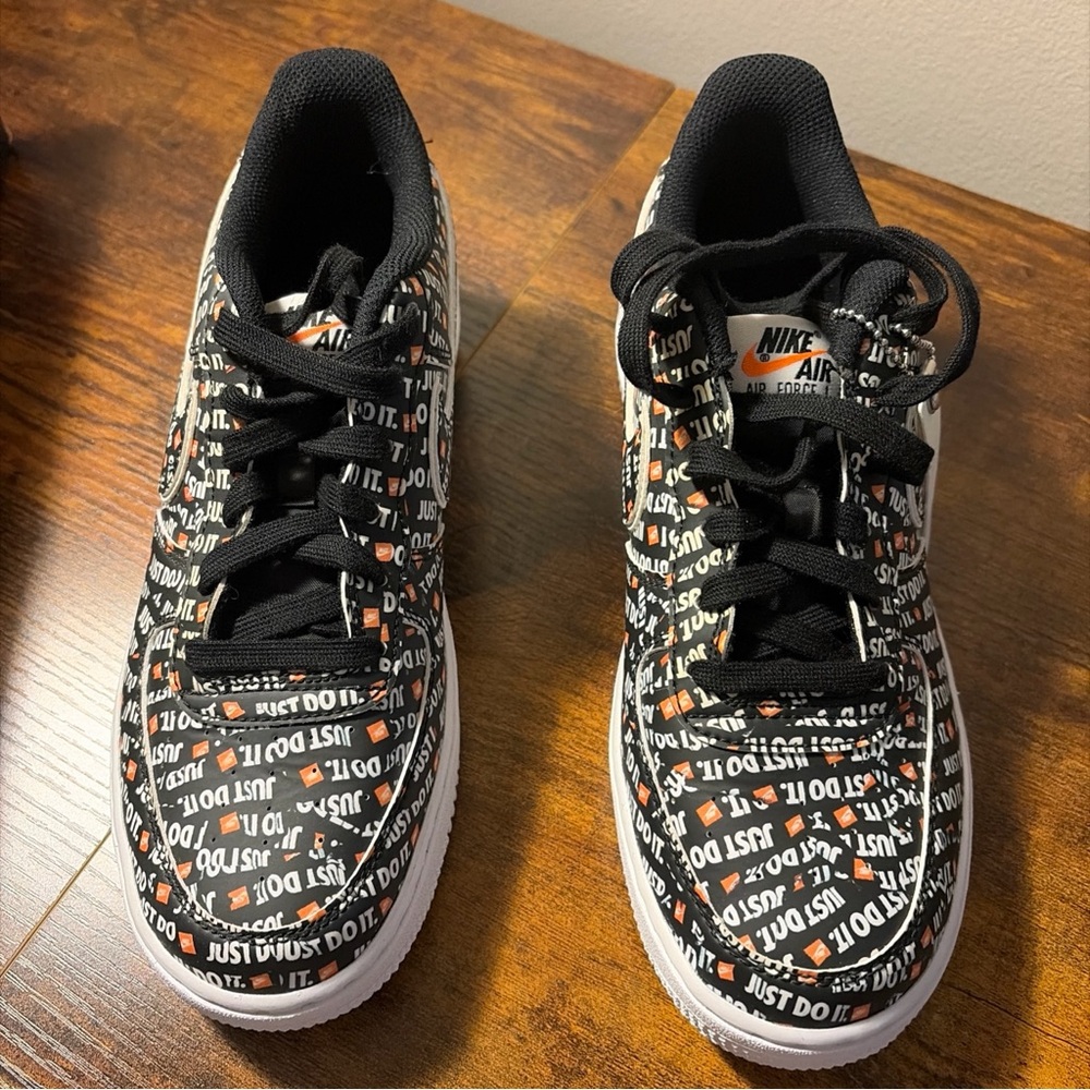Nike Kids' Black and White Sneakers with Orange Accents